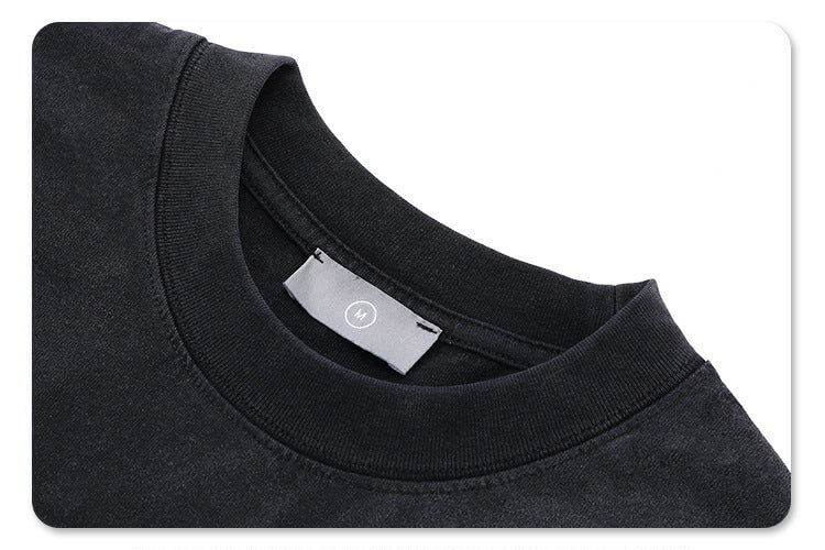 Close-up of the neckline detail on Saint Michael Kingdom Graphic T-Shirt.