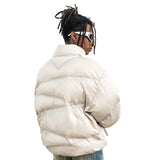 Model wearing back view solid color oversized stand collar zipper padded jacket.