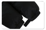 Sleeve detail of solid color oversized stand collar zipper padded jacket.
