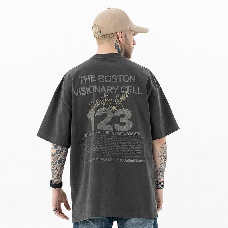 Back view of model wearing The Boston Visionary Cell graphic T-shirt