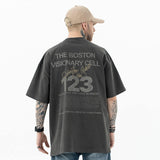 Back view of model wearing The Boston Visionary Cell graphic T-shirt
