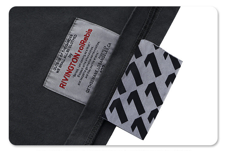 Faux pocket and fabric stitching detail on Paul Laffoley graphic T-shirt