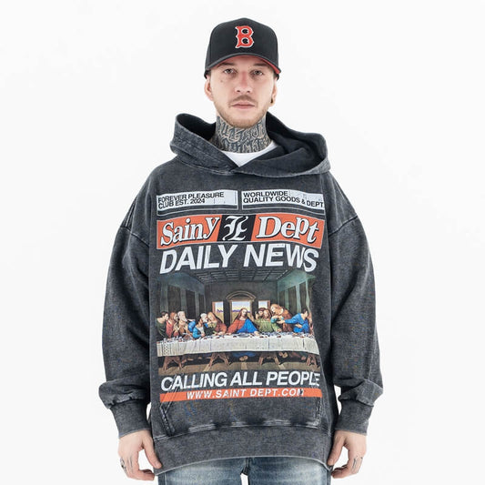 Model wearing the last supper comfort vintage wash graphic hoodie front view.
