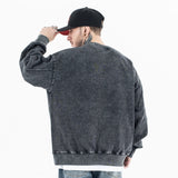 Model wearing the last supper vintage wash graphic sweatshirt back view.