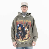 Model wearing the front view of travis scott vintage washed rap street graphic hoodie.