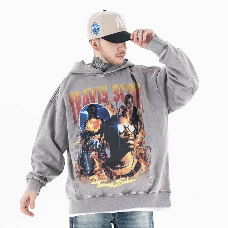 Model wearing the front view of travis scott vintage washed rap street graphic hoodie.