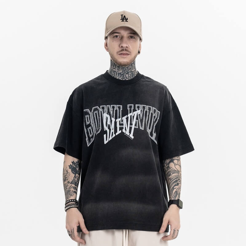 Model wearing Vintage Letter Black Graphic T-Shirt, front view.