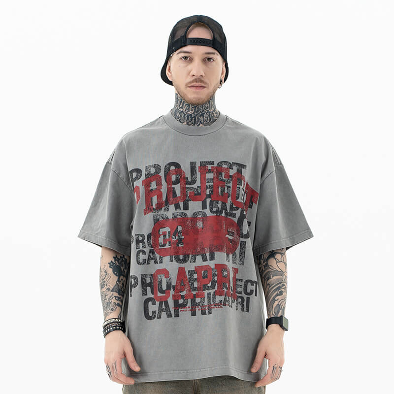 Front view of model wearing vintage letter graphic t-shirt.