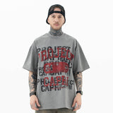 Front view of model wearing vintage letter graphic t-shirt.
