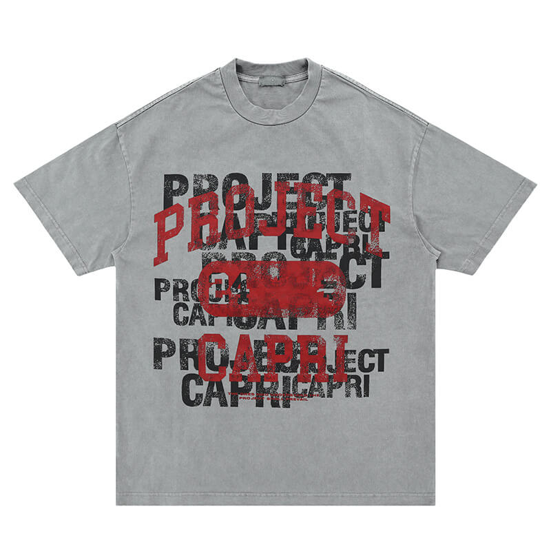 Flat lay of light grey vintage letter graphic t-shirt on display.
