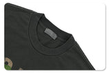 Close-up of neckline detail on vintage letter graphic t-shirt.