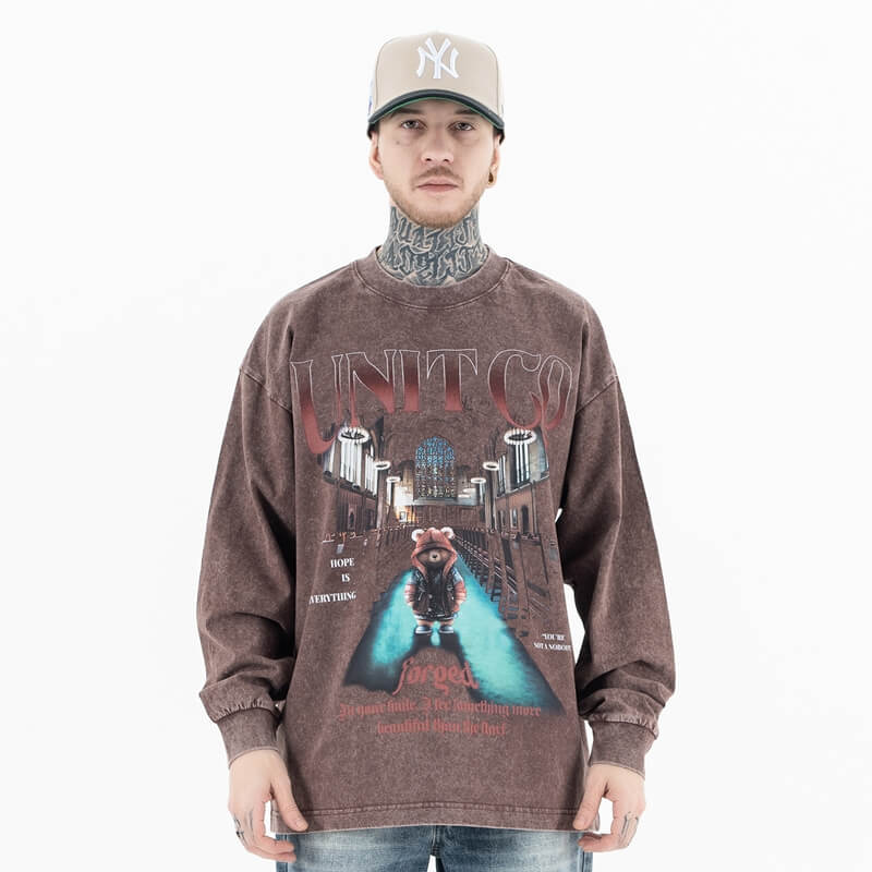 Brick red vintage wash bear alphabet long sleeve graphic t-shirt worn by model front view.