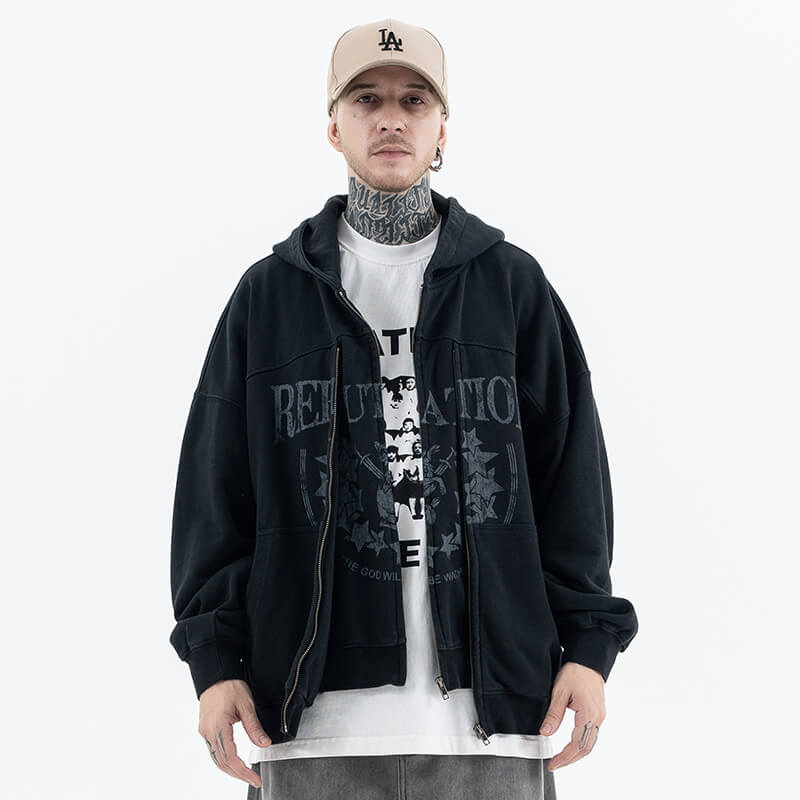 Model wearing front view of vintage wash cardigan double zipper graphic hoodie.