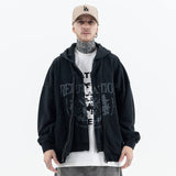 Model wearing front view of vintage wash cardigan double zipper graphic hoodie.
