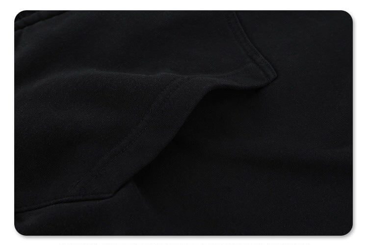 Close-up of pocket details on vintage wash cardigan double zipper graphic hoodie.