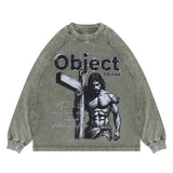 Green vintage wash long sleeve graphic t-shirt flat lay view.