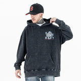 Model wearing front view of vintage wash saint hoodie.
