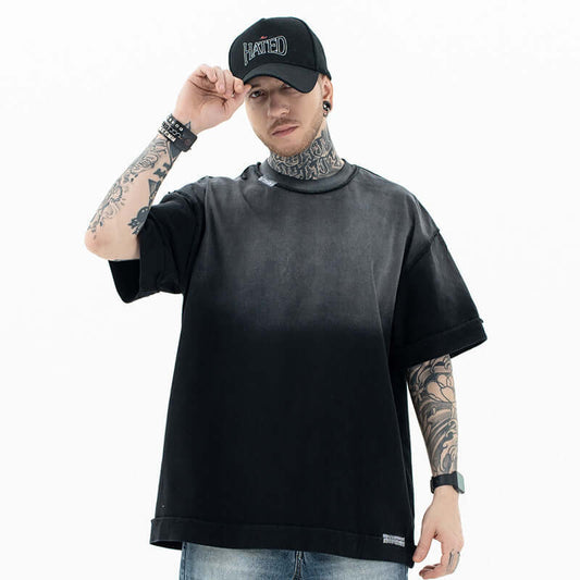 Front view of a model wearing a vintage washed gradient cotton T-shirt.