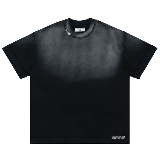Flat lay of a vintage washed gradient solid color cotton T-shirt.