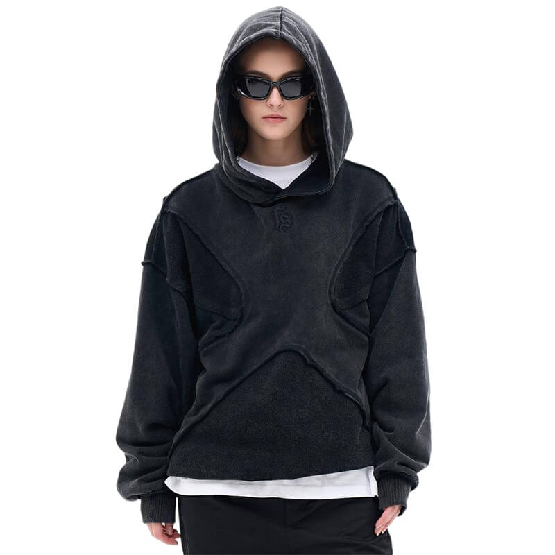 Model wearing vintage washed deconstructed minimalist letter fg graphic hoodie front view.