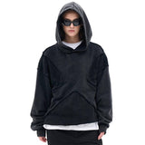 Model wearing vintage washed deconstructed minimalist letter fg graphic hoodie front view.