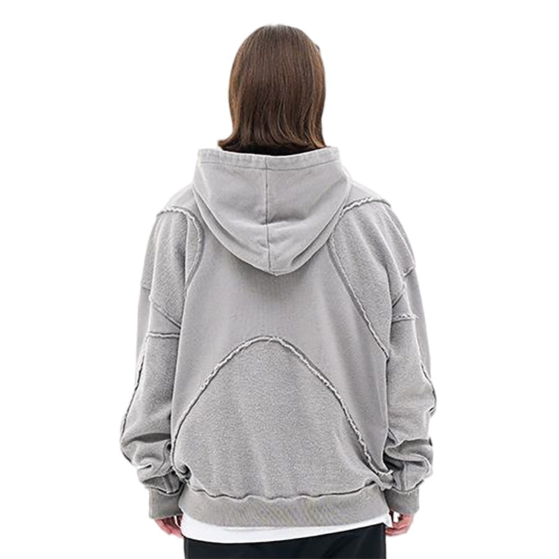 Model wearing vintage washed deconstructed minimalist letter fg graphic hoodie back view.