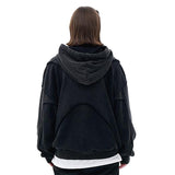 Model wearing vintage washed deconstructed minimalist letter fg graphic hoodie back view.